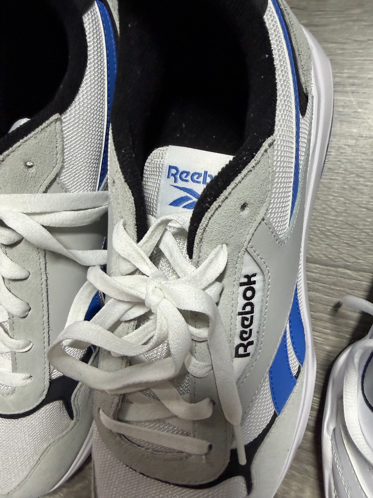 2 Pairs of Sports Shoes | 1 Men&rsquo;s Size 12 Reebok | 1 Women&rsquo;s Size 7 Nike | New