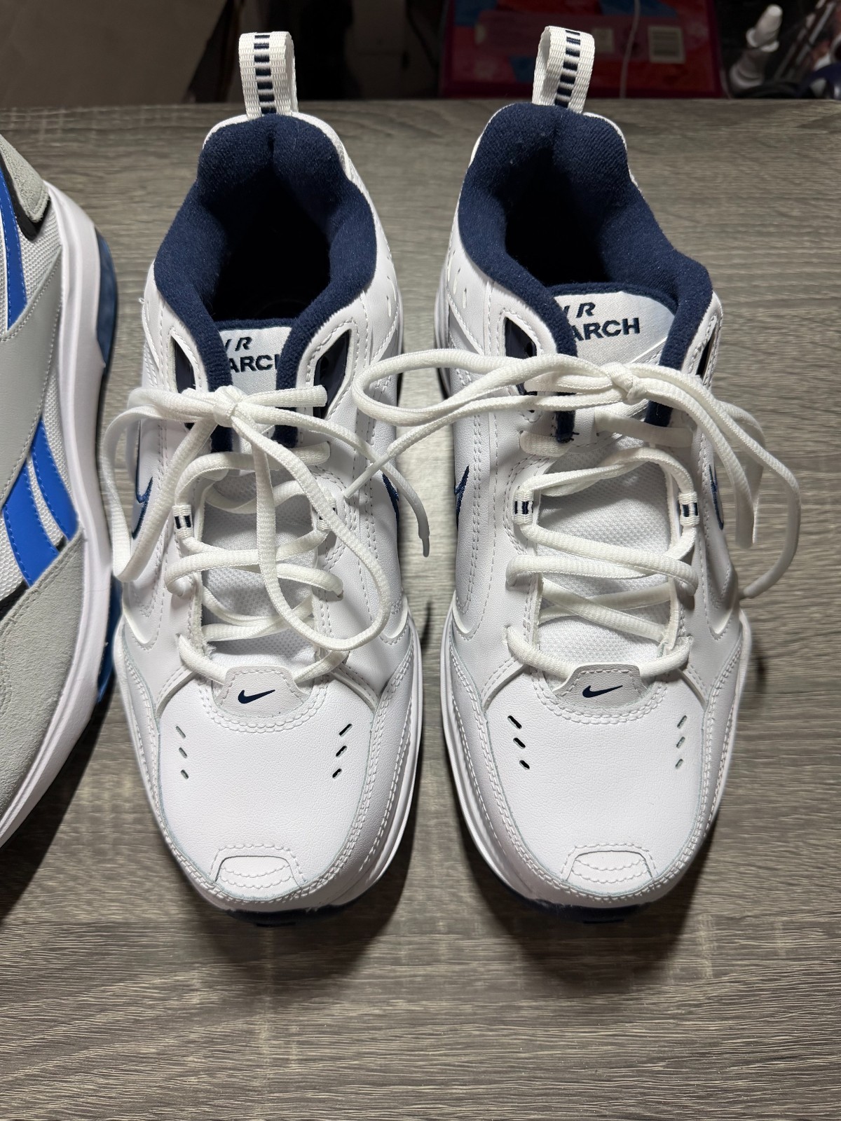 2 Pairs of Sports Shoes | 1 Men&rsquo;s Size 12 Reebok | 1 Women&rsquo;s Size 7 Nike | New