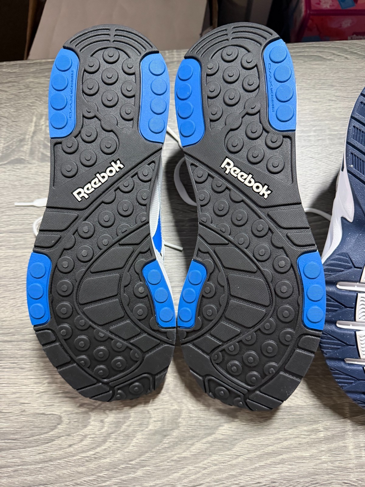 2 Pairs of Sports Shoes | 1 Men&rsquo;s Size 12 Reebok | 1 Women&rsquo;s Size 7 Nike | New