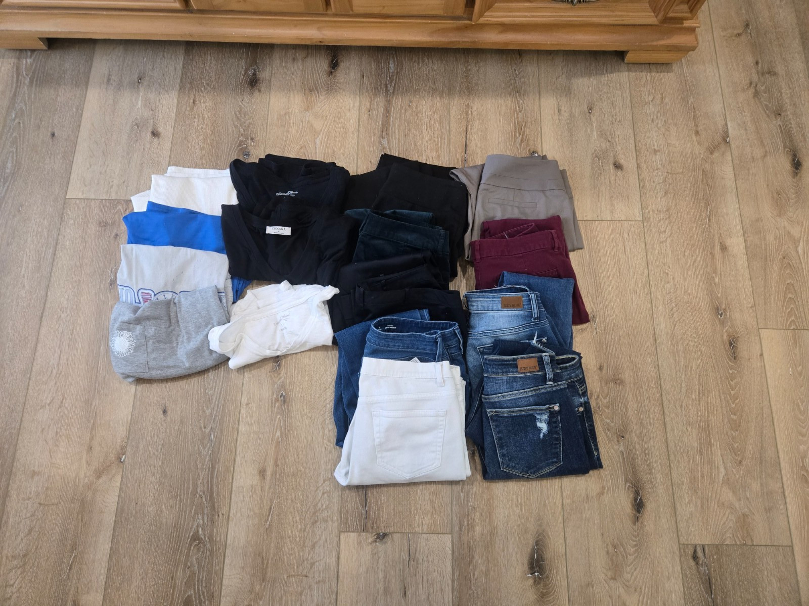womens clothes bulk lot. Nine pairs of size 8 pants and seven small to medium sh