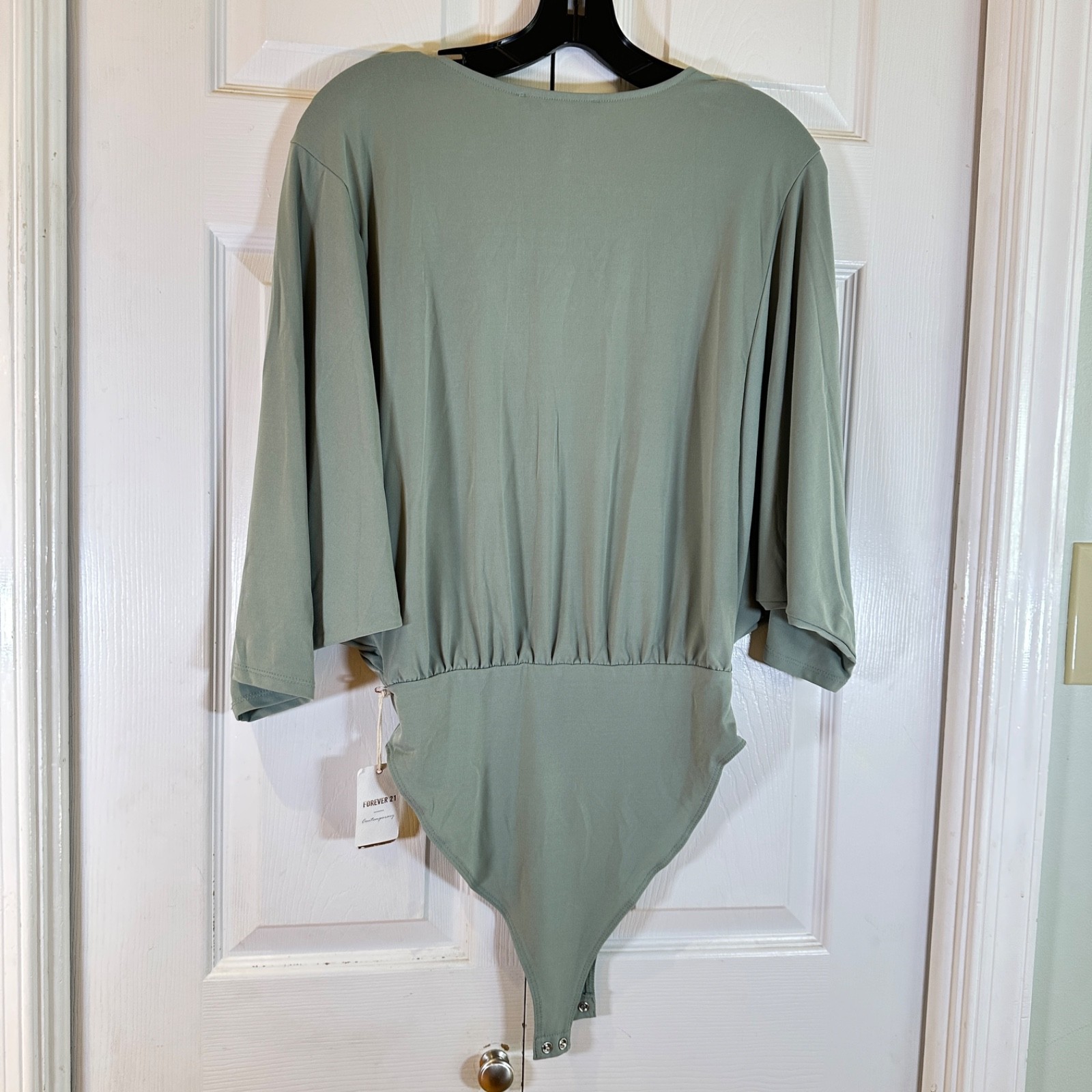 Lot of 4 Dressy Bodysuits Sizes Small and Mediums